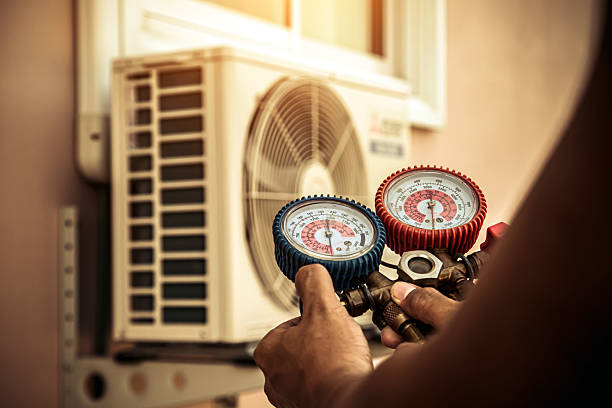 Professional Air Conditioning Service technician working in Charlottesville, VA